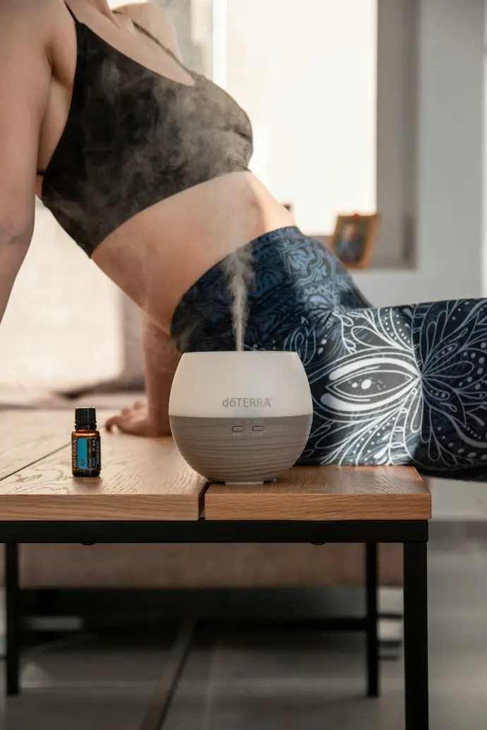 a woman in her underwear is blowing out of a humider